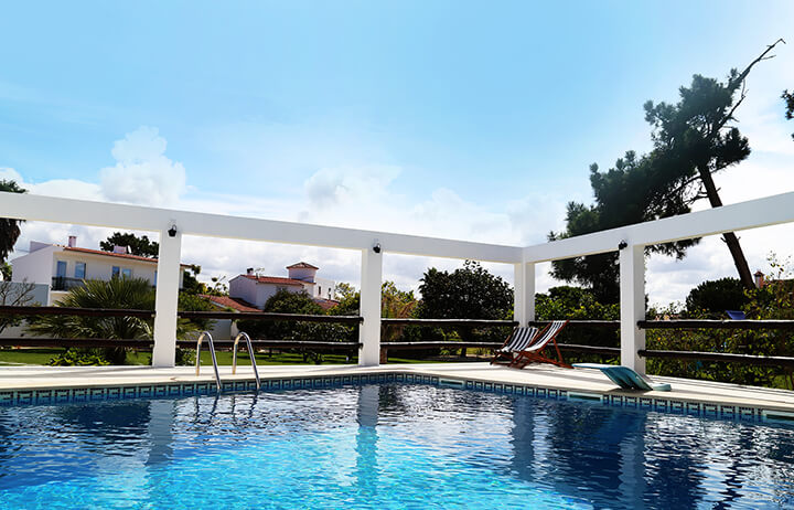 Luxury Villa swimming pool on a sunshine day