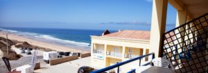 Ocean View balcony. Surf school with sunshine and beautiful beach background